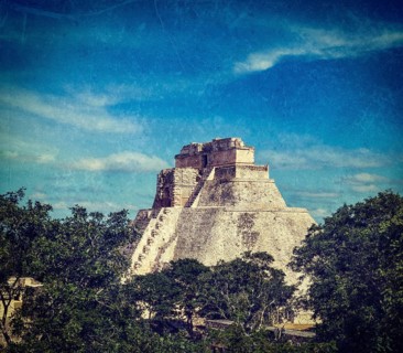 Vintage retro hipster style travel image of anicent mayan pyramid