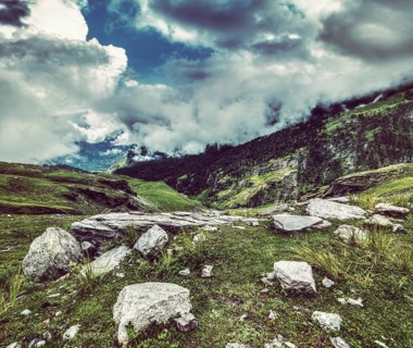 Vintage retro effect filtered hipster style travel image of mountain landscape in Himalayas. Kullu valley