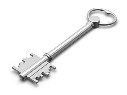 Metal key on white isolated