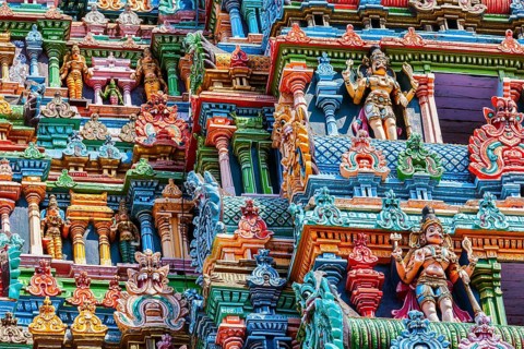 Sculptures on Hindu temple gopura tower. Meenakshi Temple