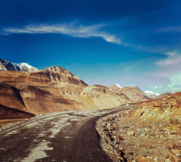 Vintage retro effect filtered hipster style travel image of Manali-Leh road to Ladakh in Indian Himalayas near Baralacha-La pass. Himachal Pradesh