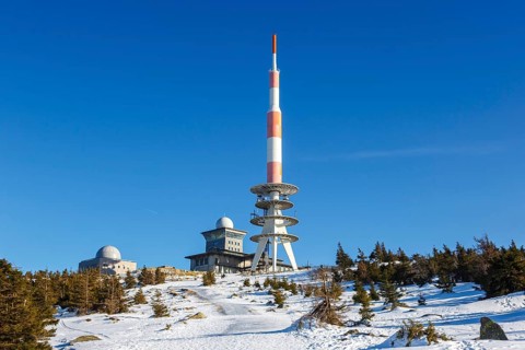 Summit of the Brocken mountain in the Harz mountains with snow in winter at the Brocken