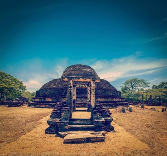 Vintage retro hipster style travel image of ancient Buddhist dagoba