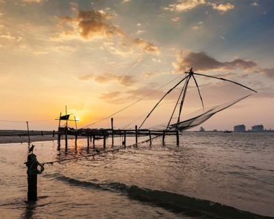 Kochi chinese fishnets on sunset. Fort Kochin