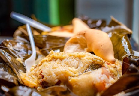 Nicaraguan Nacatamal with bread on the table