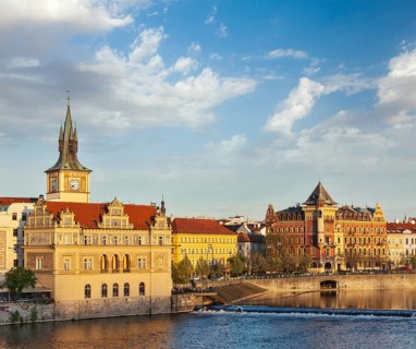 Prague Stare Mesto embankment view from Charles bridge on sunset. Prague