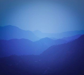 Vintage retro effect filtered hipster style travel image of mountains Himalayas after sunset. With copyspace. Shimla