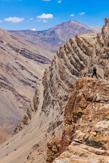 Photographer taking photos in Himalayas mountains. Spiti valley