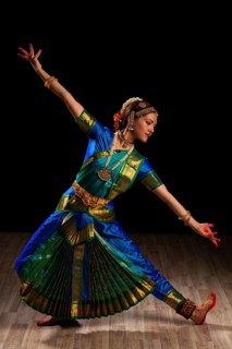 Young beautiful woman dancer exponent of Indian classical dance Bharatanatyam