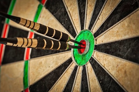 Success hitting target aim goal achievement concept background
