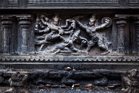 Bas relief depicting Durga slaying demon