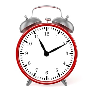 Red retro styled classic alarm clock isolated on white