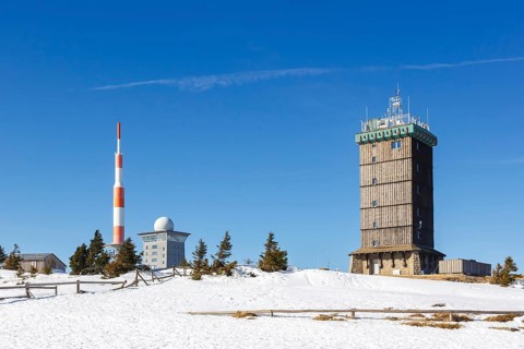 Summit of the Brocken mountain in the Harz mountains with snow in winter at the Brocken