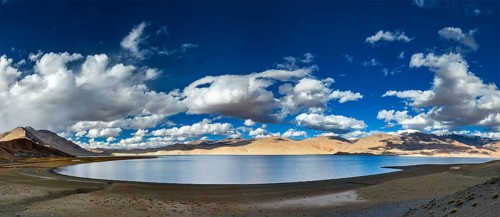 Panorama of Himalayas and Himalayan lake Tso Moriri on sunset