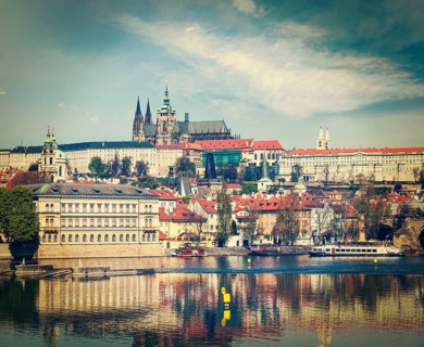 Vintage retro hipster style travel image of Charles bridge over Vltava river and Gradchany