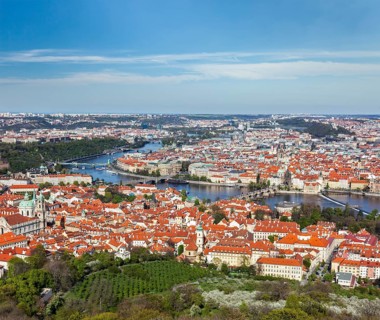 Aerial view of Charles Bridge over Vltava river and Old city from Petrin hill Observation Tower. Prague
