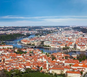Aerial view of Charles Bridge over Vltava river and Old city from Petrin hill Observation Tower. Prague