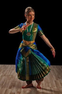 Young beautiful woman dancer exponent of Indian classical dance Bharatanatyam