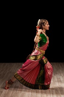 Young beautiful woman dancer exponent of Indian classical dance Bharatanatyam