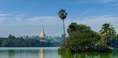 Panorama of Shwedagon Pagoda over Kandawgyi Lake in Yangon