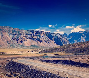 Vintage retro effect filtered hipster style travel image of Manali-Leh road to Ladakh in Indian Himalayas near Baralacha-La pass. Himachal Pradesh