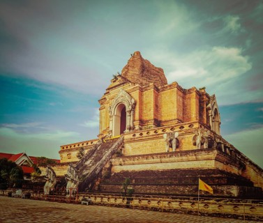 Vintage retro hipster style travel image of Buddhist temple Wat Chedi Luang. Chiang Mai