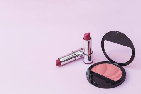 Two lipsticks pink blusher pink background. Resolution and high quality beautiful photo