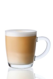 Cup of hot frappuccino in transparent glass isolated on white background