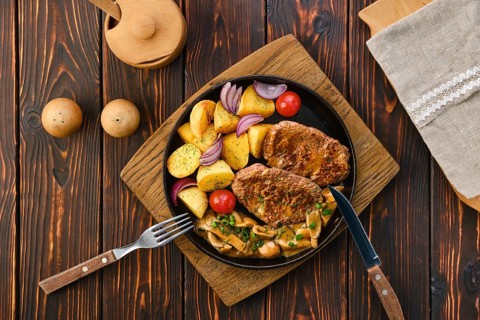 Plate with fried pork fillet