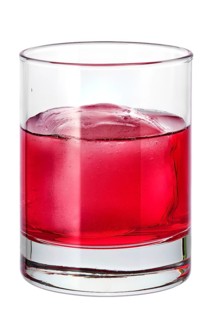 Glass of cold cranberry juice with ice isolated on white