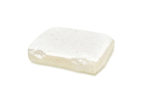 Piece of feta cheese isolated on white background