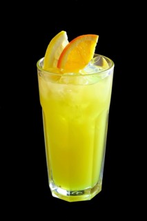 Glass of kiwi and lemon lemonade isolated on black