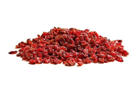 Heap of dry barberry on white background