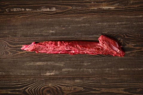 Overhead view of raw fresh top round beef strip