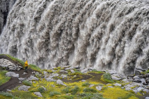 Tourist standing at a canyon