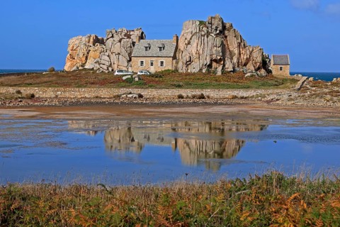 Country house between rocks near Le Gouffre