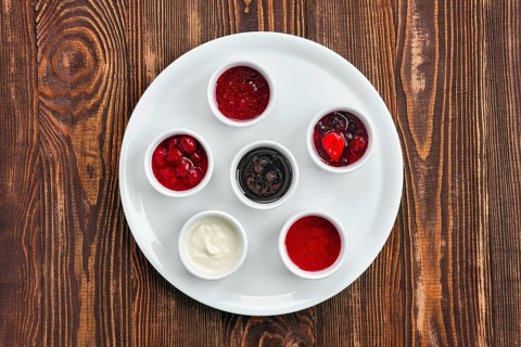 Overhead view of assortment of fruit puree. Jam