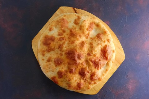 Baked oysters covered with bannock