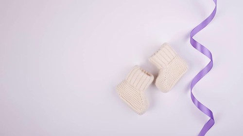 Purple ribbon socks copy space 1