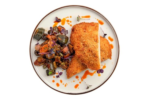 Cutlet with stuffing in breading with fried eggplant