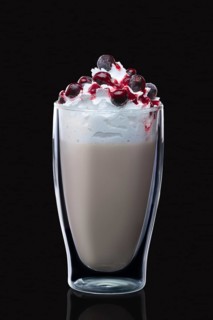 Double-walled glass with coffee cocktail isolated on black. Photo with clipping path