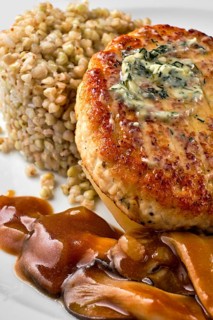 Close up view of meat cutlet with honey mushroom and green buckwheat