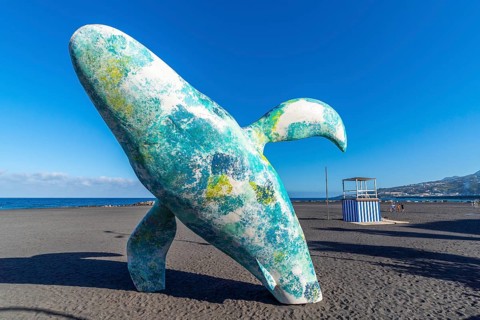 Modern sculpture of a whale