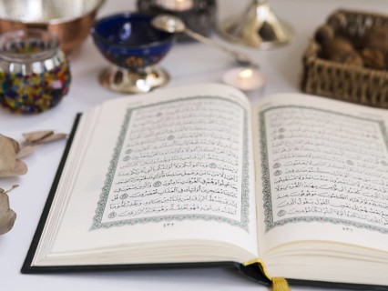 Close up opened quran table
