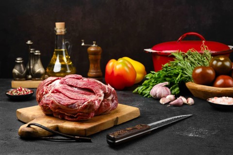 Raw lamb cump ready for cooking on the kitchen table