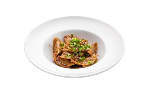 Deep-fried japanese gyoza or dumplings snack with soy sauce isolated on white background