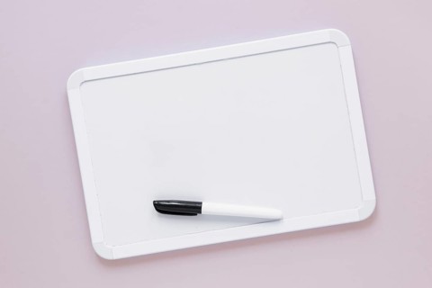 Flat lay whiteboard with marker top