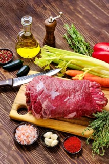 Beef roll with vegetables as a stuffing for baking in oven