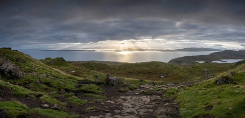 Sunbeams through sky