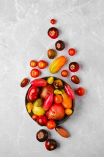 Top view of plate with different types of tomatoes